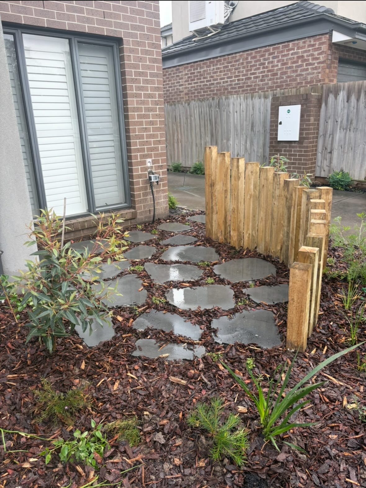 Stepping stones with timber post screening