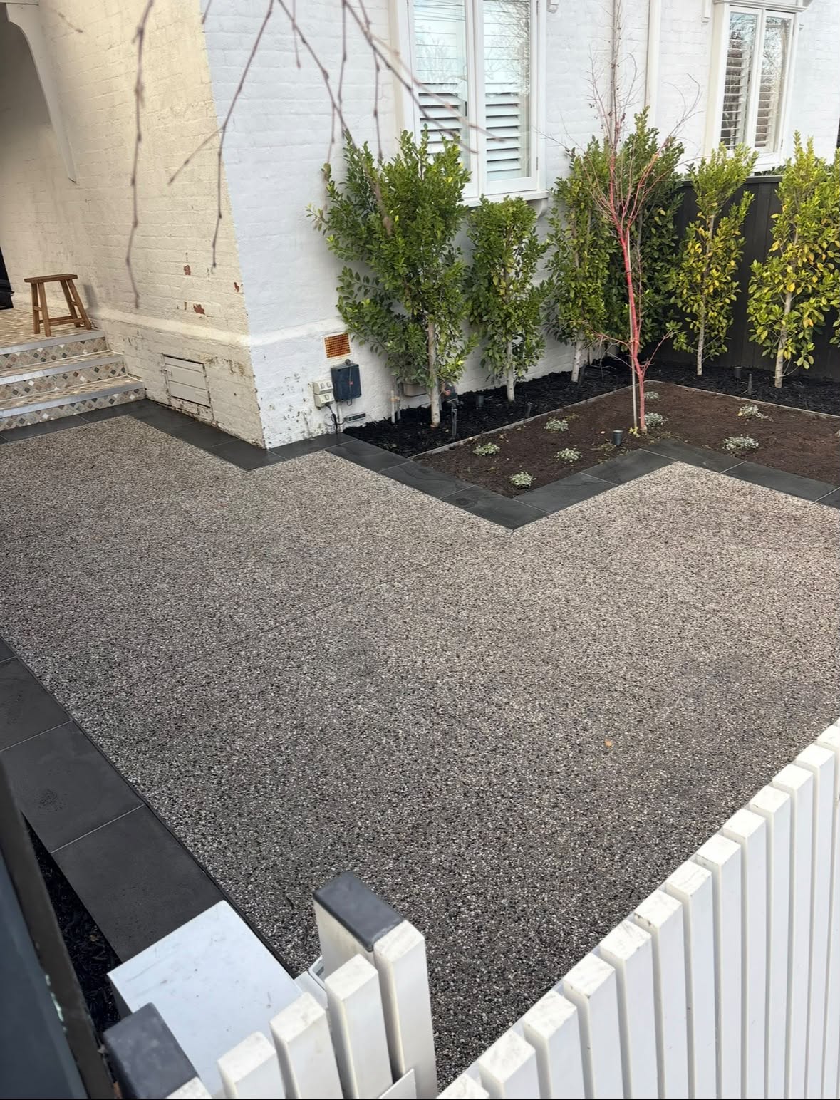 Exposed aggregate driveway with bluestone border